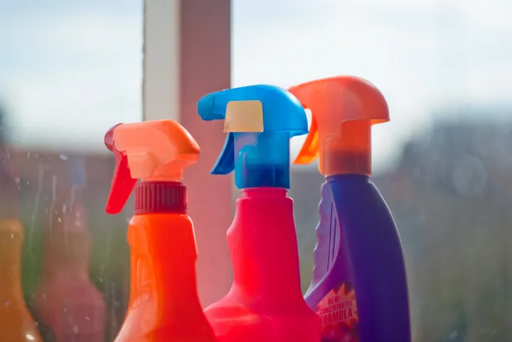 Three cleaning spray bottles 