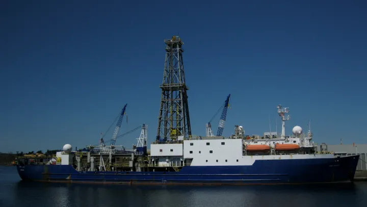 a ship with a massive steel tower