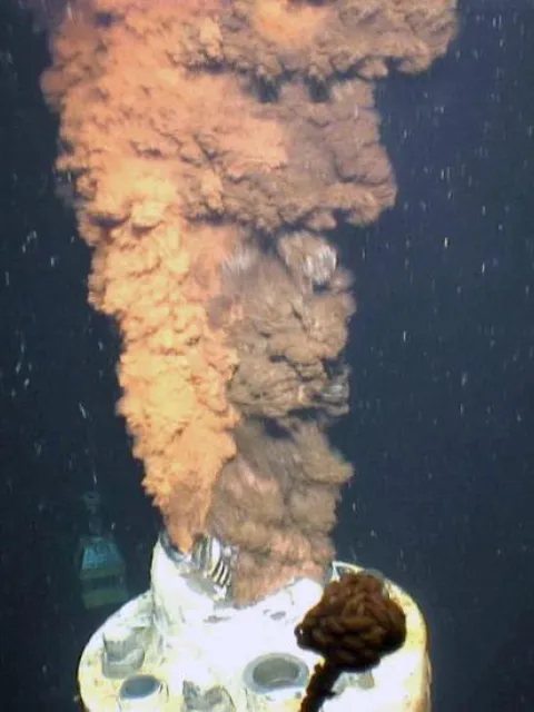 A large plume of oil escapes from the damaged Macondo wellhead