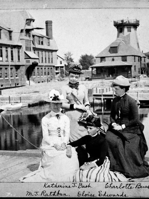 Three women on a pier
